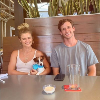 Cayden Boyd and Jenna Boyd with their dog, Demi Michelle.